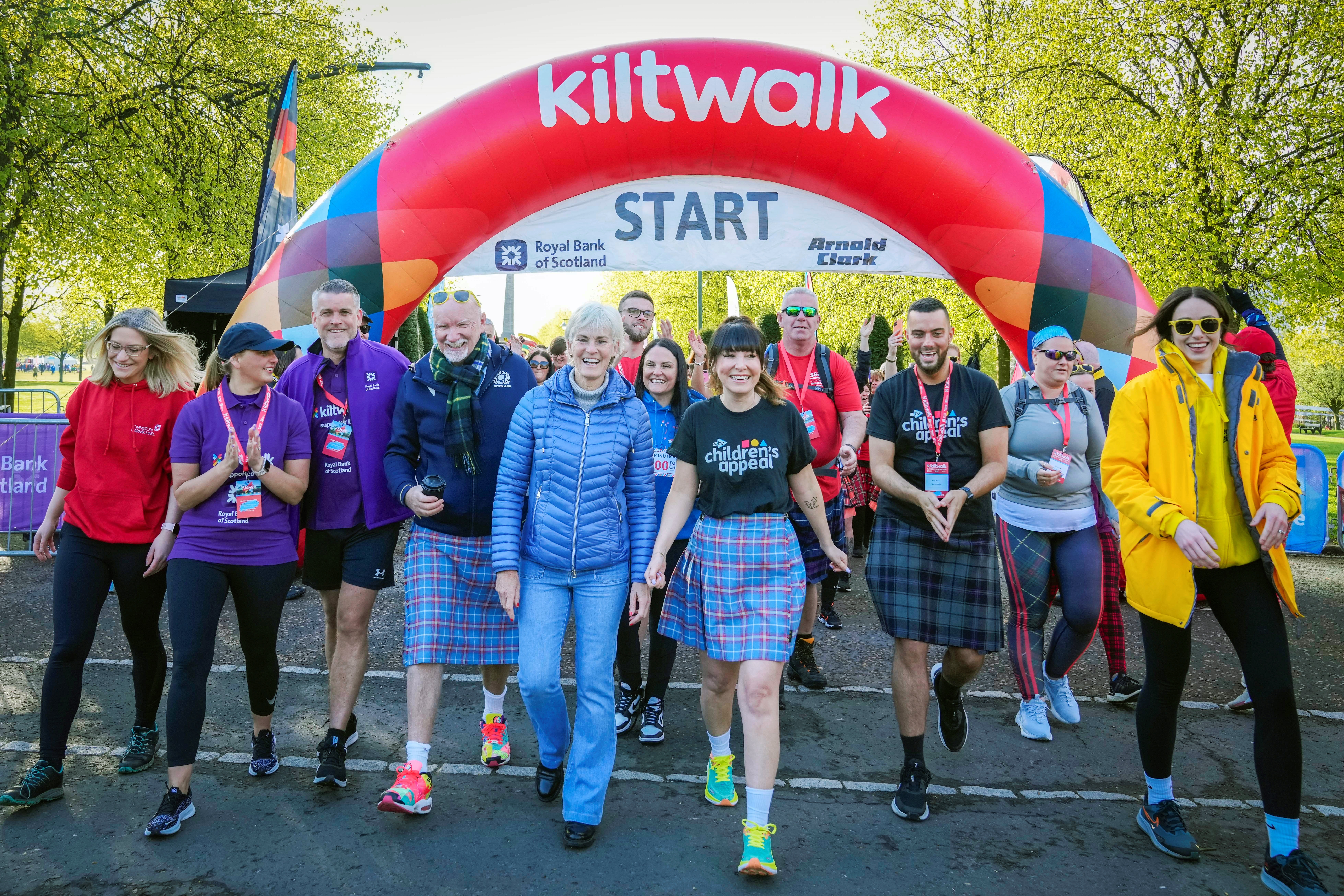 Sir Tom Hunter, Judy Murray and Kiltwalk Sponsors lead out the Mighty Stride